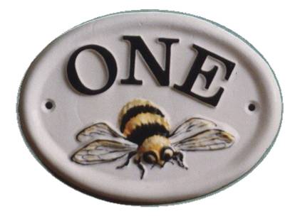 a bee house sign